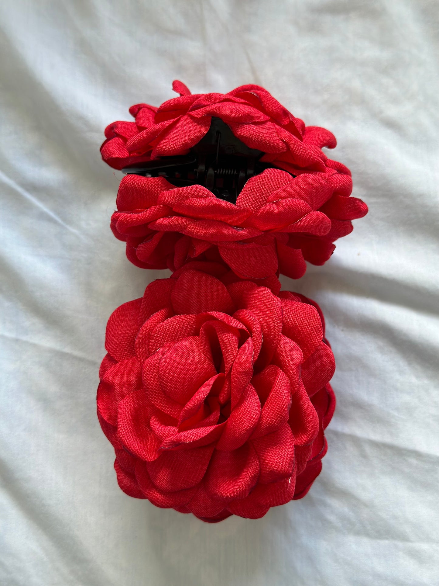 Pinza flor roja