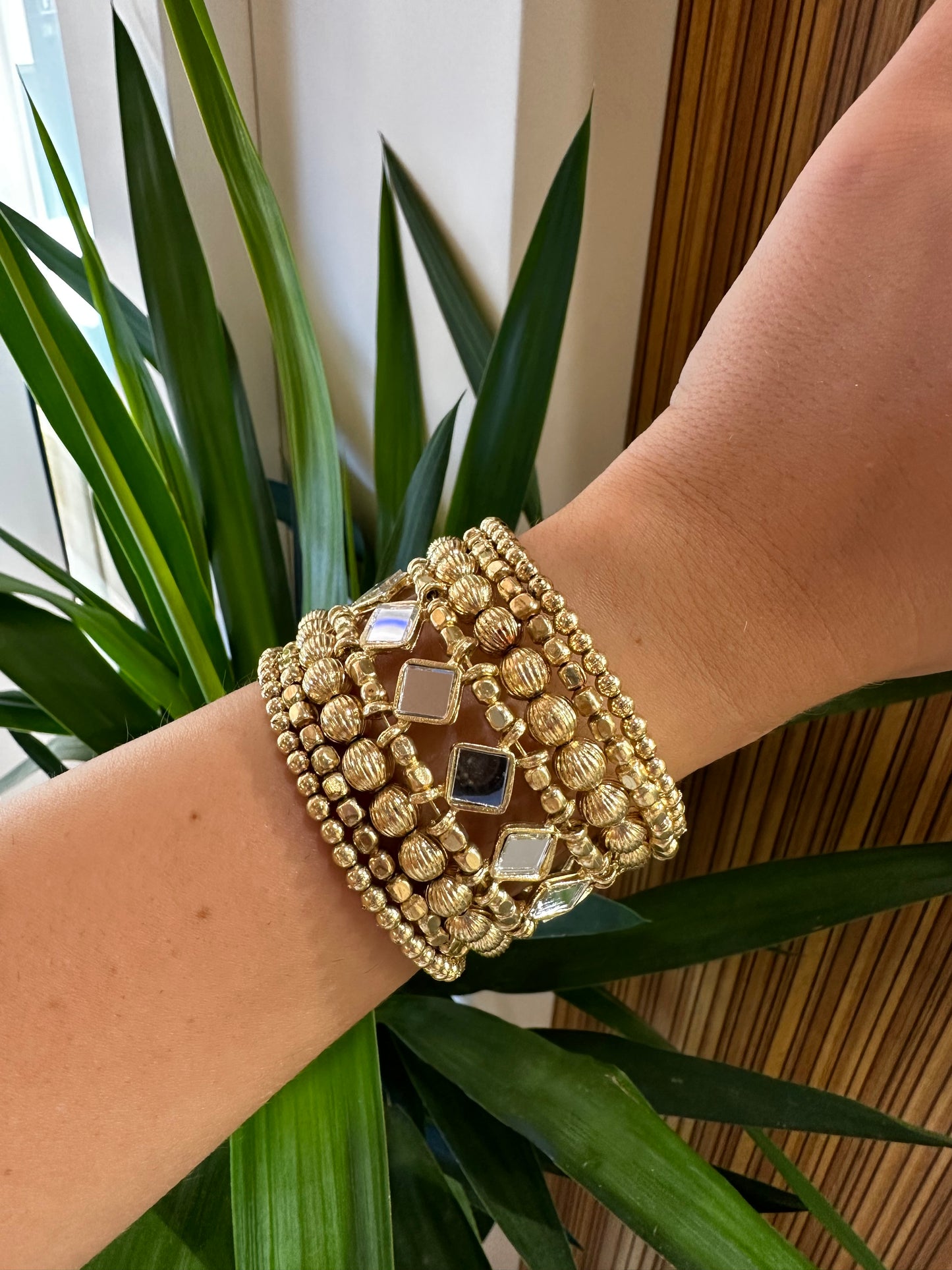 Brazalete espejos dorado