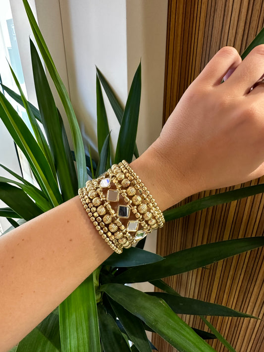 Brazalete espejos dorado